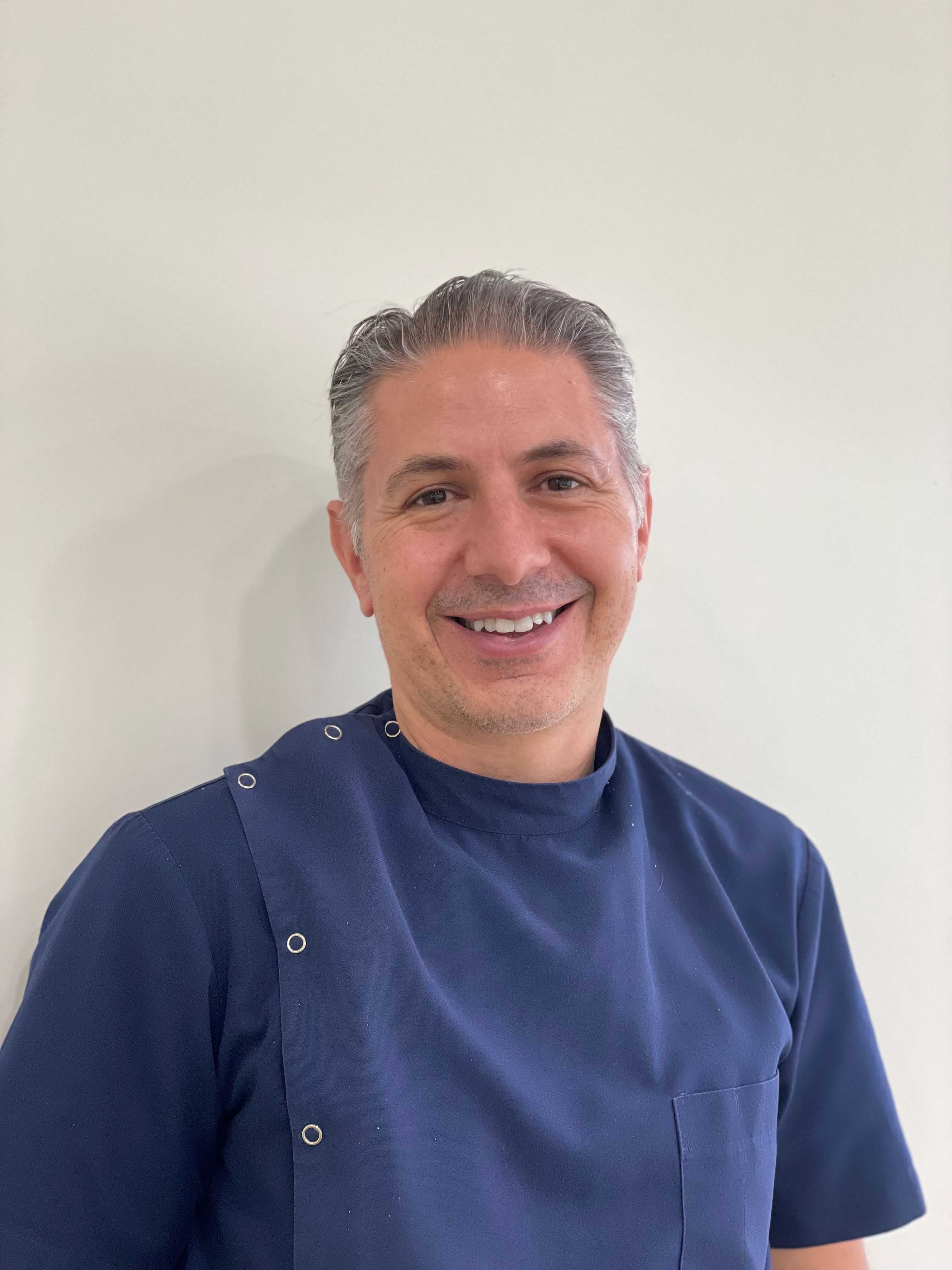 DR. Adrian Serafini