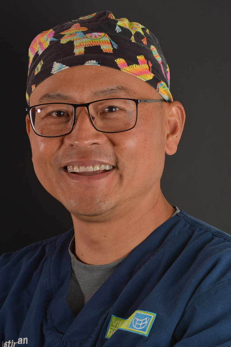 Dr Justin Tan