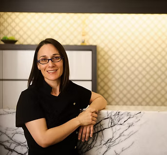 DR. ANDREA PERDIS