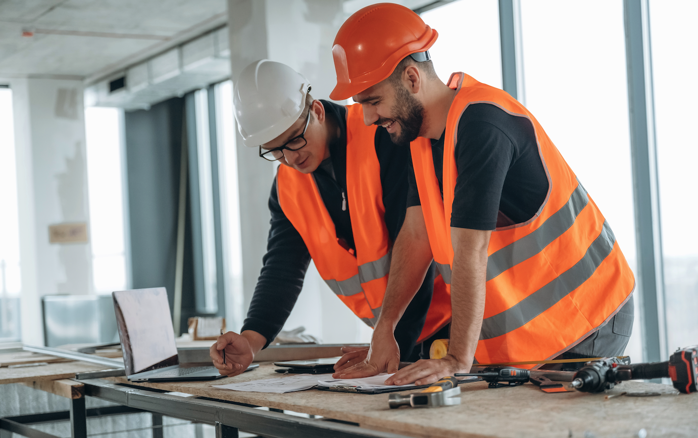 Stressed construction worker with headache